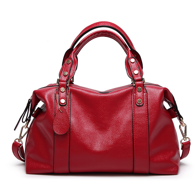 Jolie sac Boston en cuir pour femme