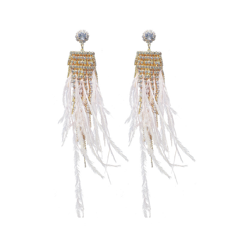 Boucles d'oreilles en plaqué or avec plumes – Image 3